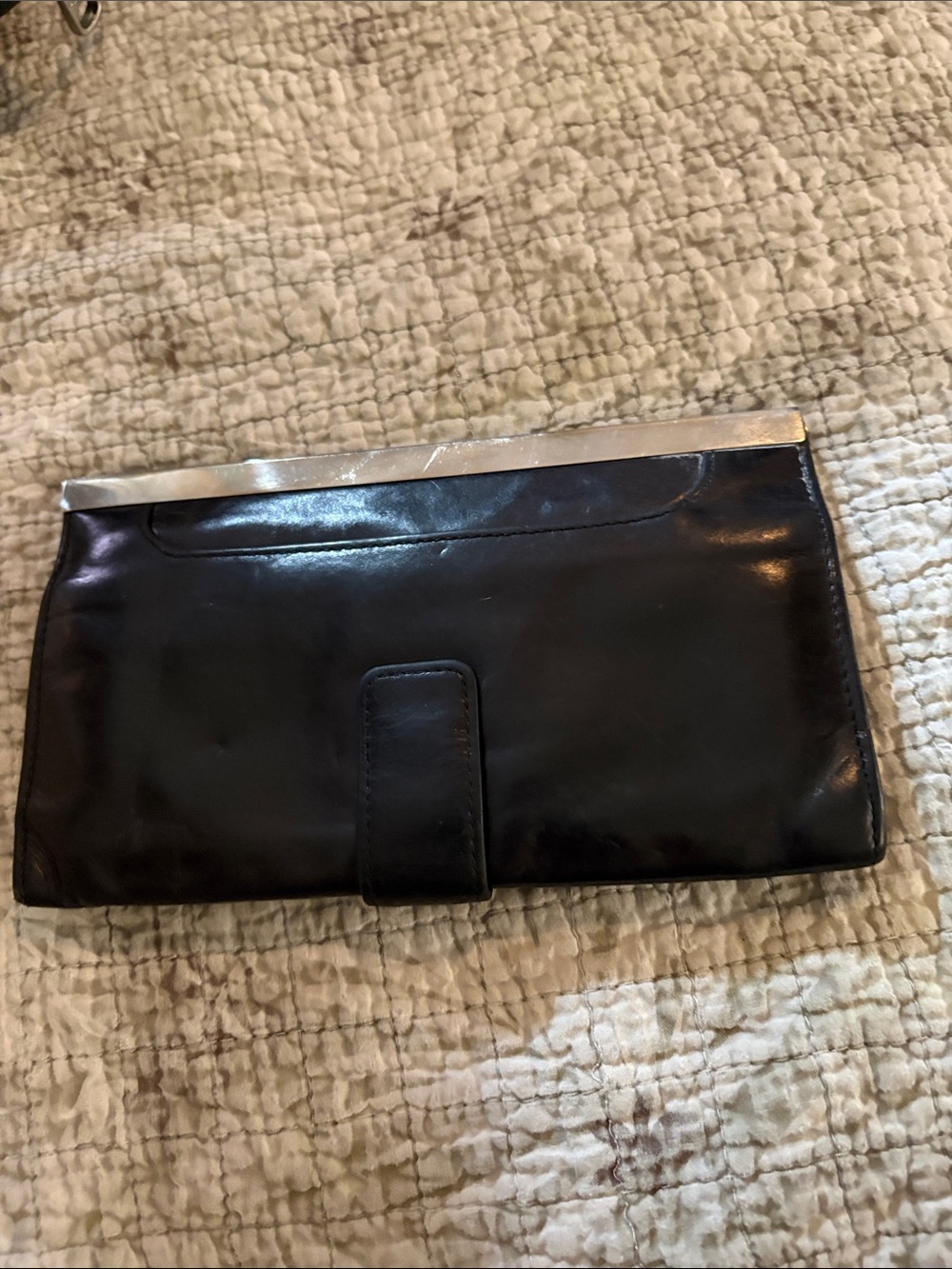 Hobo Sleek Black Leather Clutch with Silver Trim